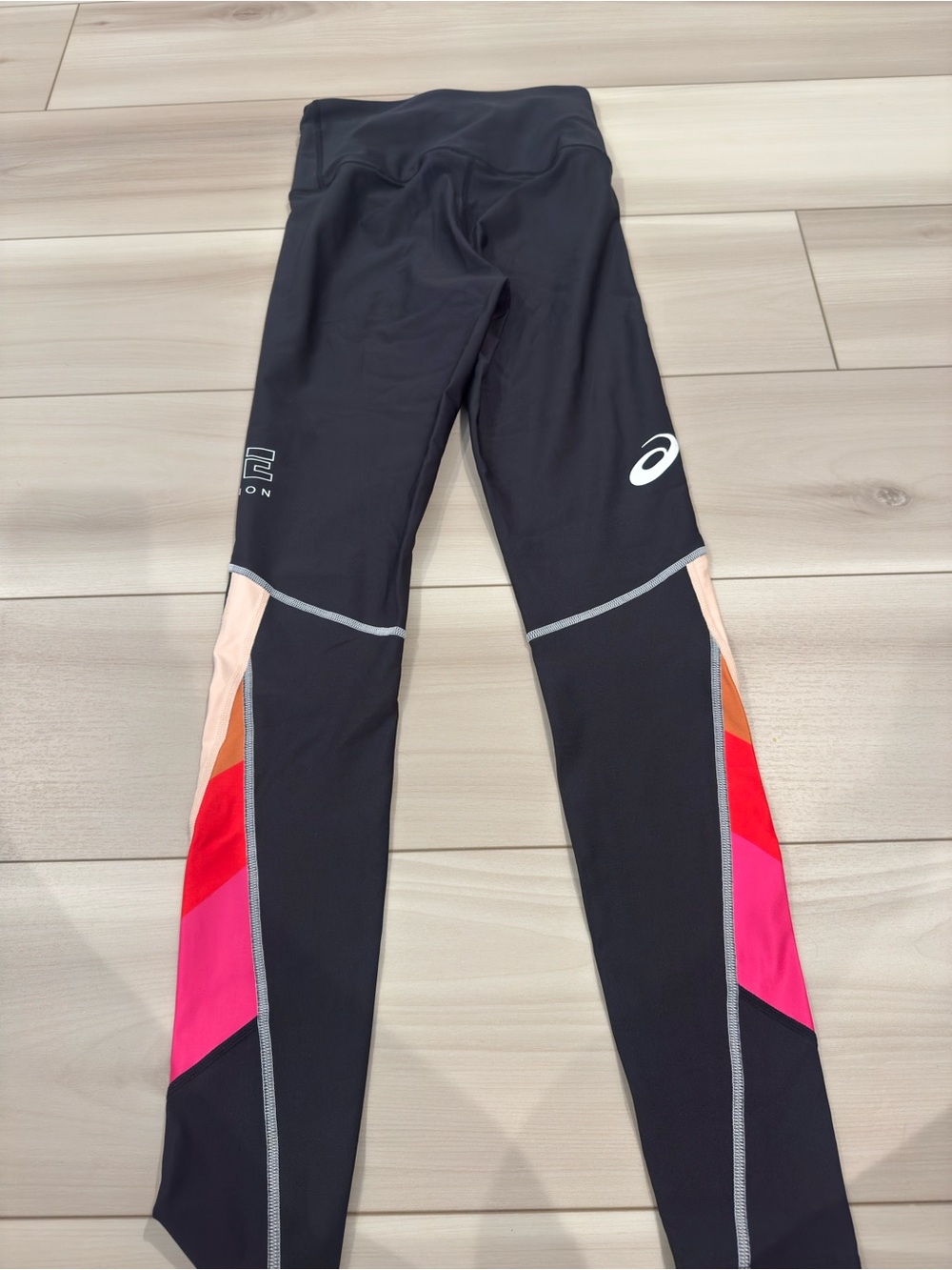 P.E Nation Black Leggings with Pink, Red & Orange Panels